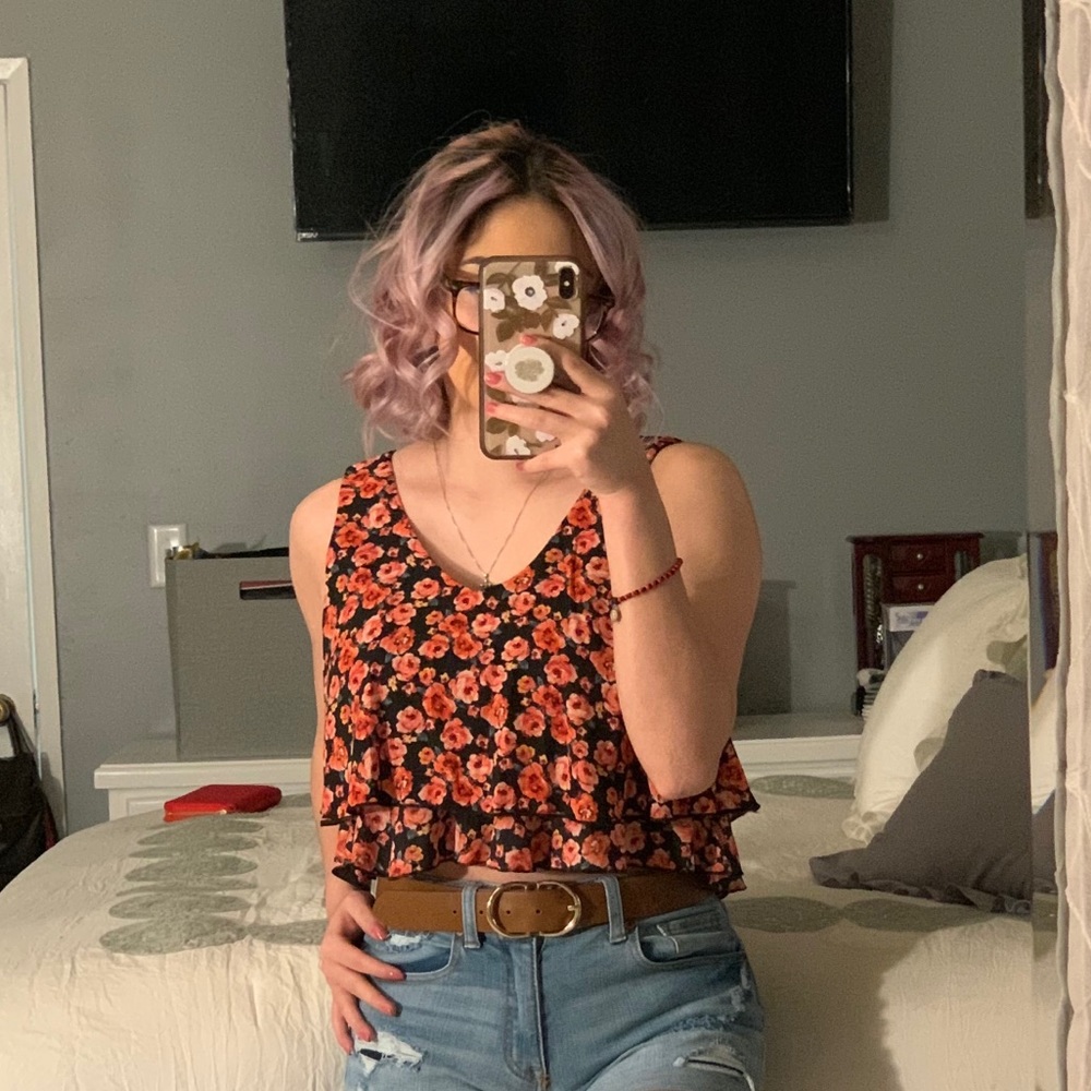 Woman’s floral sleeveless top